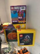 Boxed Lego Brickheadz Fortnite figurine of Brite Bomber (40728) with boxed Lego Creator pumpkin