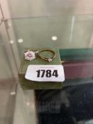9ct gold ring set single small stone together with a 925 marked silver ring set cubic zirconia