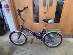 Challenge Tornado folding commuter's bike in purple and silver