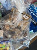 +VAT A bag containing a selection of dog treats to include ham bones, knuckle bones ect.
