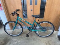 Apollo Impact 15 speed mountain bike in green
