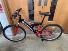 Trax TF51 mountain bike in black and red