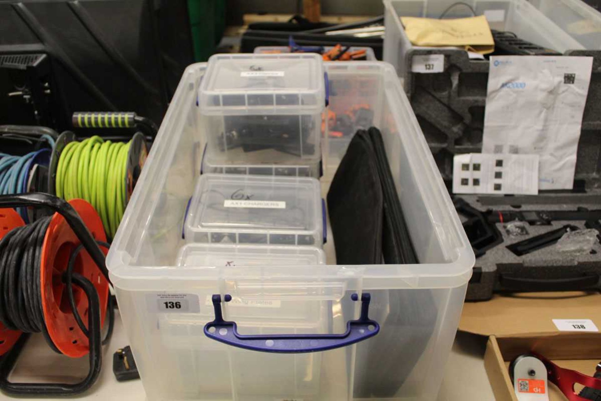 +VAT Plastic box containing diffuser, domes, wing plates, AX1 chargers, AX3 clamps and AX3 chargers