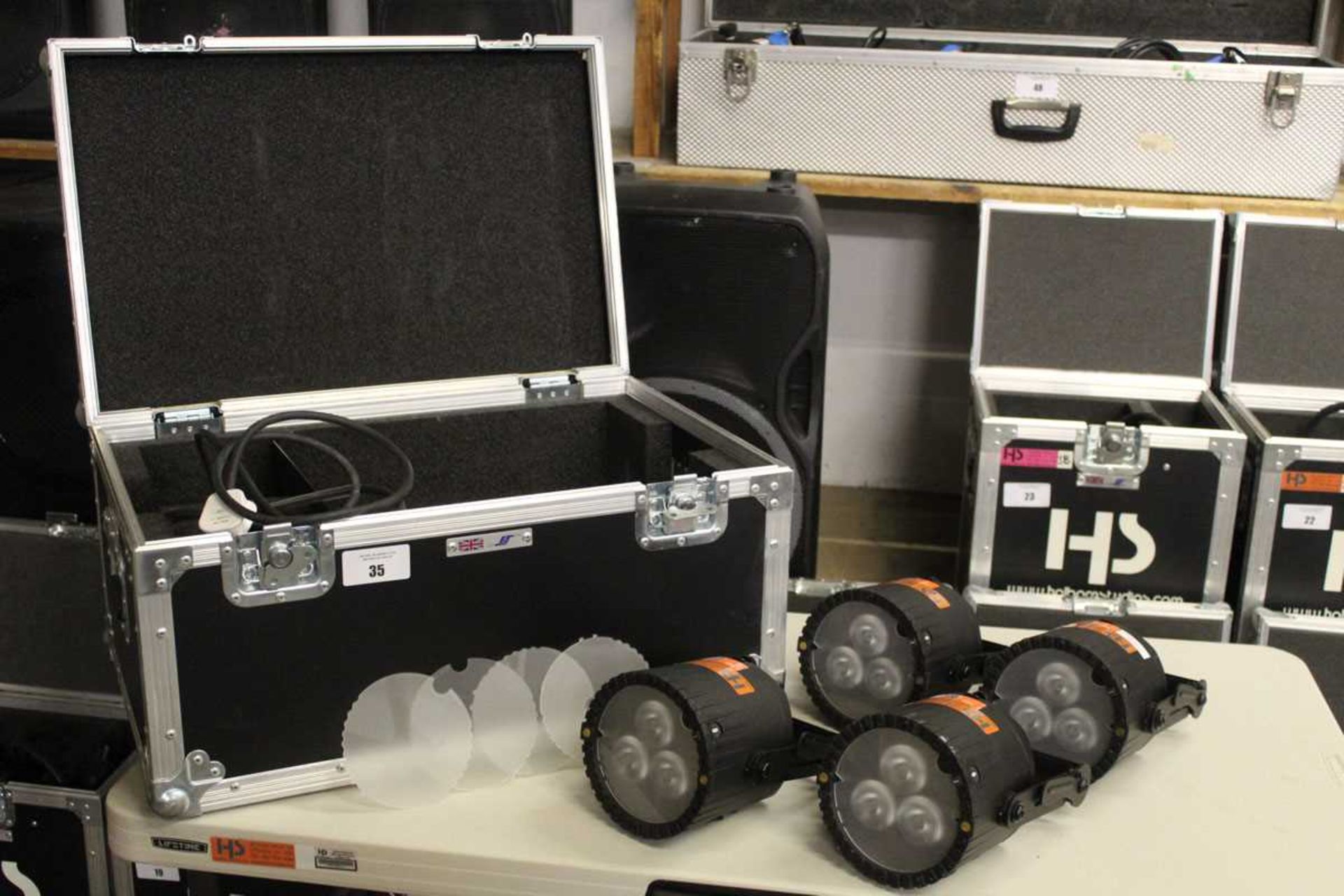 +VAT Set of four Astera AX5 Triple PAR spotlights with associated cable in flight case