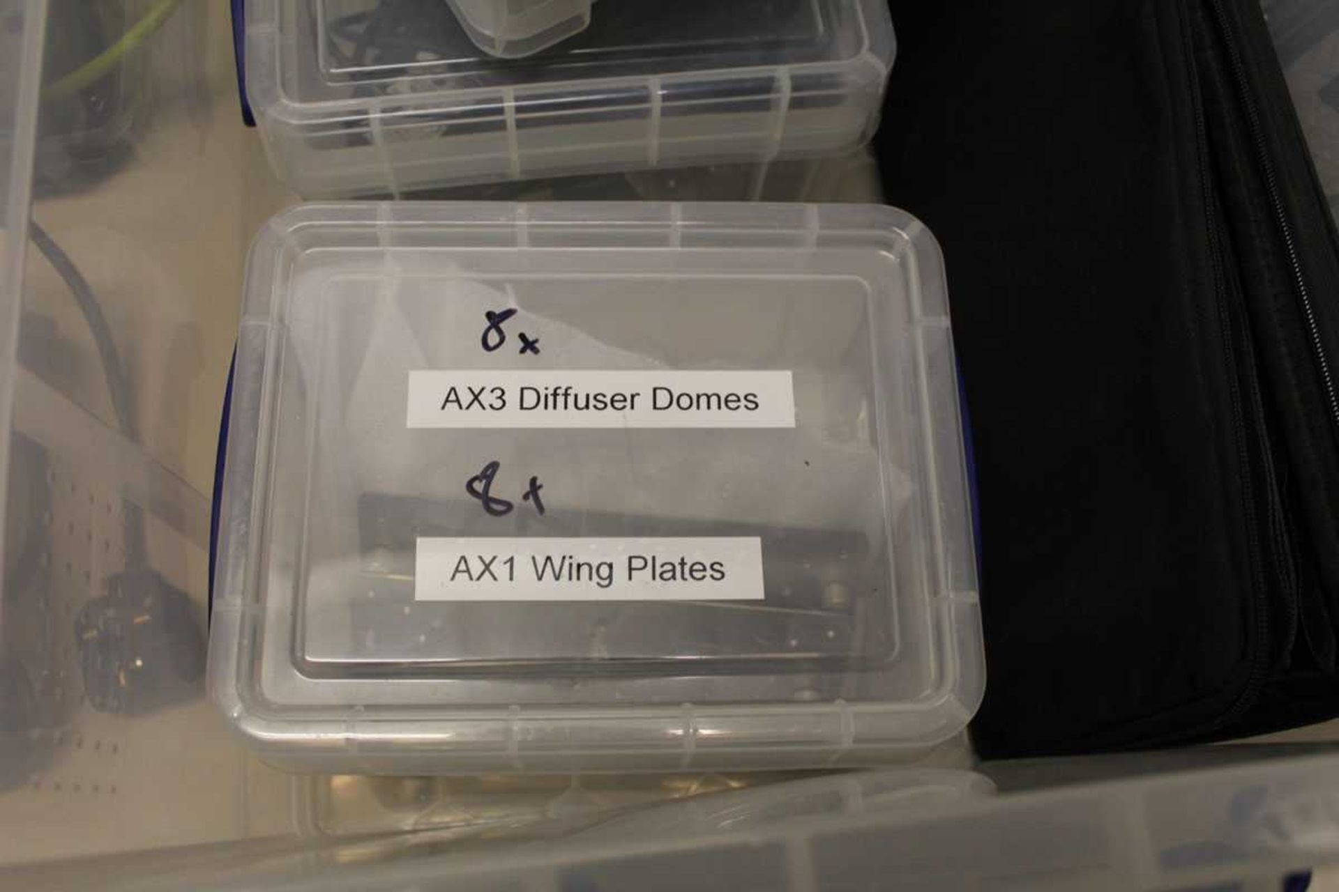 +VAT Plastic box containing diffuser, domes, wing plates, AX1 chargers, AX3 clamps and AX3 chargers - Image 5 of 5