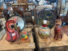 Collection of hand painted ornaments including oriental dragon, floral patterned plates of