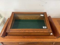 Oak counter top display case with green baize lining, together with a wooden serving tray