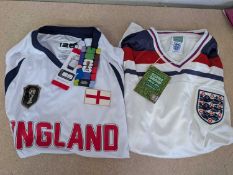 +VAT 1 official retro England shirt (size L) and 1 official FIFA England World Cup 2026 (size M)