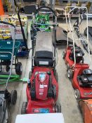 Toro self propelled petrol lawnmower with rear grass collection box