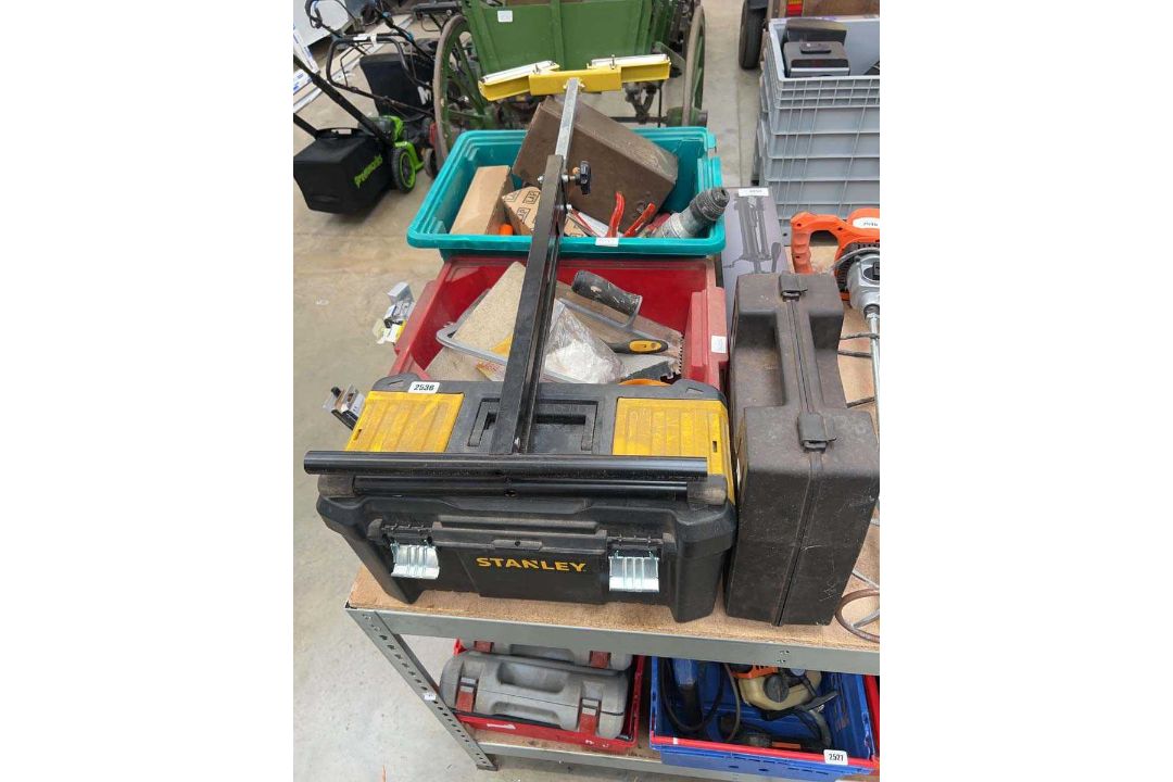 Quantity of mixed tooling to include Stanley toolbox, roller saw stand, trowels etc. - Image 1 of 2