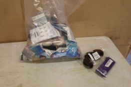 +VAT Bag of assorted accessories including face masks, hair scrunchies, wallets, purses, leg warmers