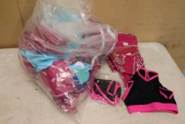 Approx. 30 pink bandanas an a large number of children's crop top plus various other items to in