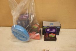 +VAT Bag of assorted exercise equipment and accessories including inflatable balls, pumps, yoga