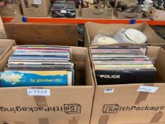 2 boxes containing vinyl records