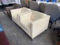 +VAT A pair of Walter Knoll 'Foster 500 Range' armchairs in cream leather on metal legs