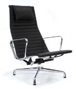 +VAT Charles & Ray Eames for Vitra, an EA124 lounge chair with headrest upholstered in black leather