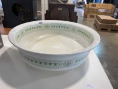 White ceramic bowl with green decoration