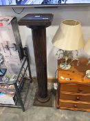 Dark oak pedestal shaped plant stand