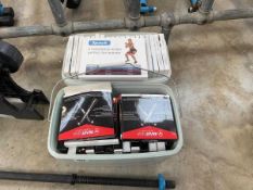 Box of womans resistance bands together with a box of fitness ropes