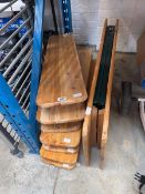 Wooden fold out table, together with 4 fold out pine benches