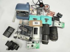 +VAT Quantity of digital and film cameras plus various accessories