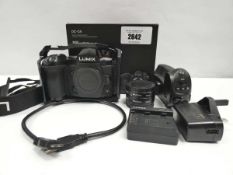 +VAT Panasonic Lumix DC-G9 camera body with Neewer half cage and Battery grip, 16mm & 10mm Meke