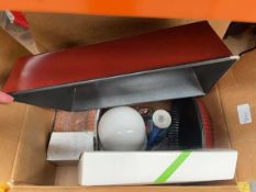 Box containing baking trays, mugs etc