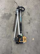 Eckman yellow petrol strimmer with a hedge trimmer attachment