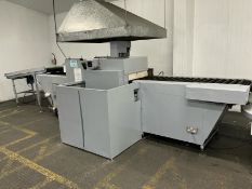Aweta Cucumber shrink tunnel heat wrapper.