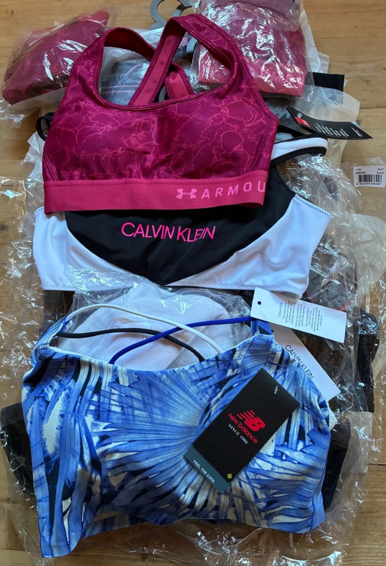 Title: 20 Sports Bra Including Clavin Klein, Under Armour & New BalanceDescription: 20 sports bras