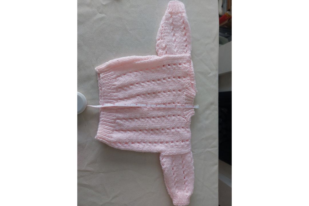 Title: Hand Knitted Baby JumperDescription: Stunning baby jumper in pink. Hand knitted. Â  Fastens - Image 4 of 5