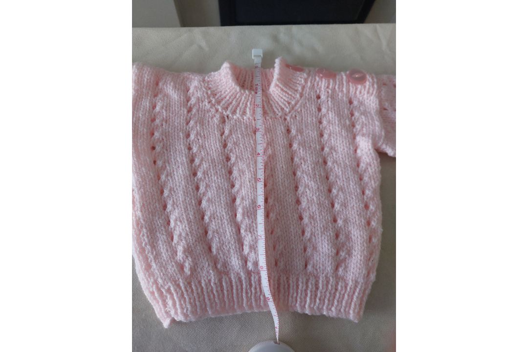 Title: Hand Knitted Baby JumperDescription: Stunning baby jumper in pink. Hand knitted. Â  Fastens - Image 3 of 5