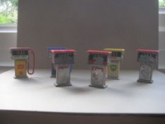 A Group of Six Vintage Metal Miniature Petrol Pumps