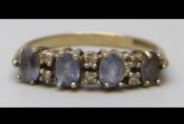 A 9ct Gold and Diamond Ring Set With Blue Stones, 1.5g