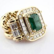 14K chain ring detailed with emerald and brilliant