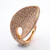 An exquisite 18k rose gold leaf ring detailed with 1.62ct brilliant