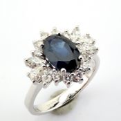 18K white gold cluster ring detailed with sapphire and