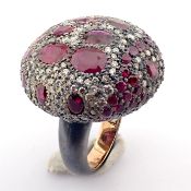 An exquisite ring detailed with vibrant rubies, brilliant diamonds and gold on silver - Hand Made