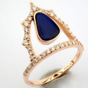 18K Rose gold ring , detailed with doublet opal and brilliant