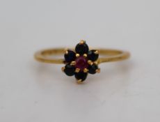 Vintage Ruby and Sapphire Cluster Ring in High Carat Gold