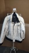 Lotto white jacket size S. EST Â£20