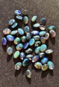 51.95ct Natural Black Fire Opals