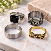 Title: Set of Four Mixed Design Fashion Rings Description: A decorative set of four fashion rings in