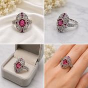Title: Vintage Style Pink Stone Silver-Tone Statement Ring Description: Elegant vintage-inspired