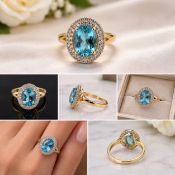 Title: Blue Gemstone Halo Ring - Size 17 Description: Elegant gold-tone ring featuring a large