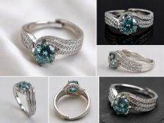 Title: 2ct Blue Moissanite Statement Ring Description: Elegant ring featuring a 2ct round
