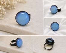 Title: Blue Cabochon Adjustable Ring – Black Tone Metal Description: Attractive statement ring