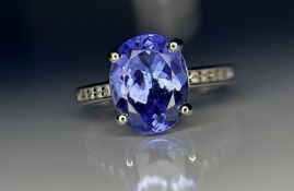 Beautiful 3.41 CT Natural Tanzanite With Natural Diamonds & 18k Gold