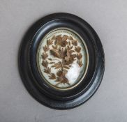 Ovaler Rahmen mit Echthaar-Einlage (19. Jh.)
