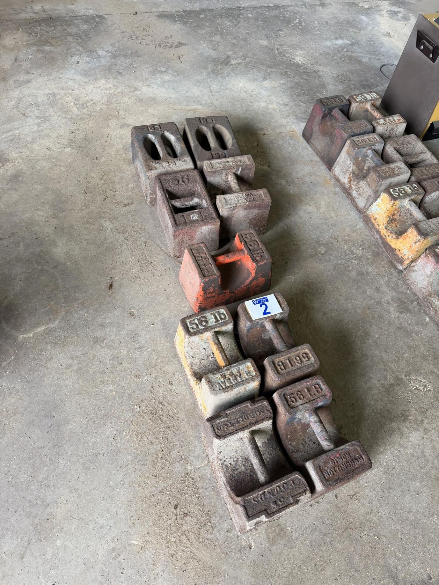 9x 56lb weights - Image 2 of 2